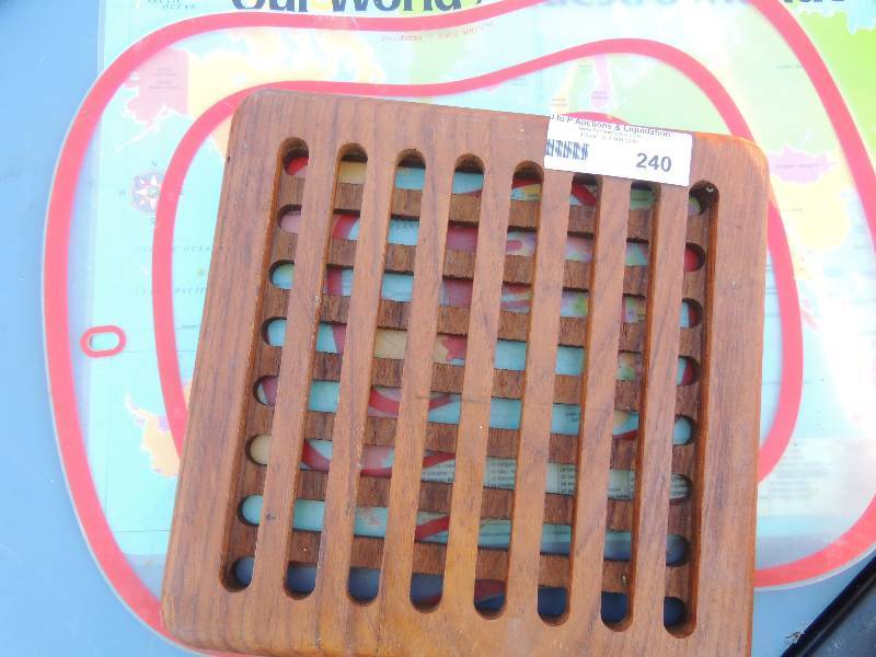 lot 240 image: WOOD Trivet, world placemat,...