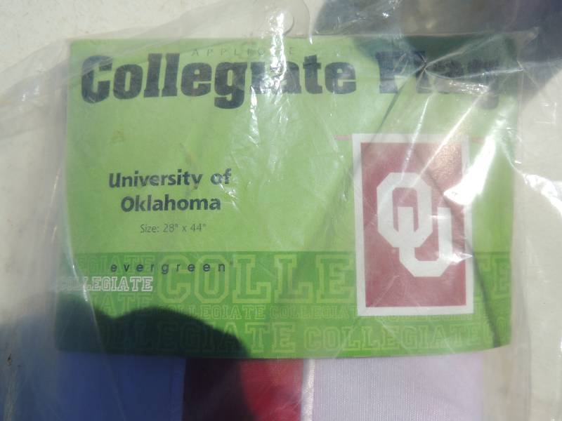 lot 246 image: Oklahoma University Flag new in pa...
