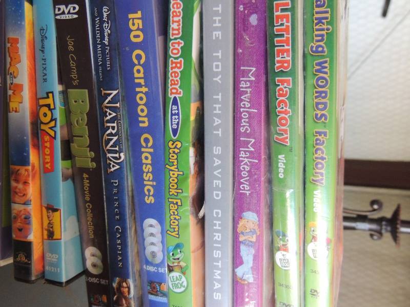 lot 335 image: 12 movies DVD   -  Toy story , LETT...