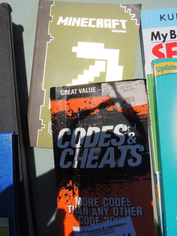 lot 344 image: Codes and Cheats book FOR VIDEO GA...