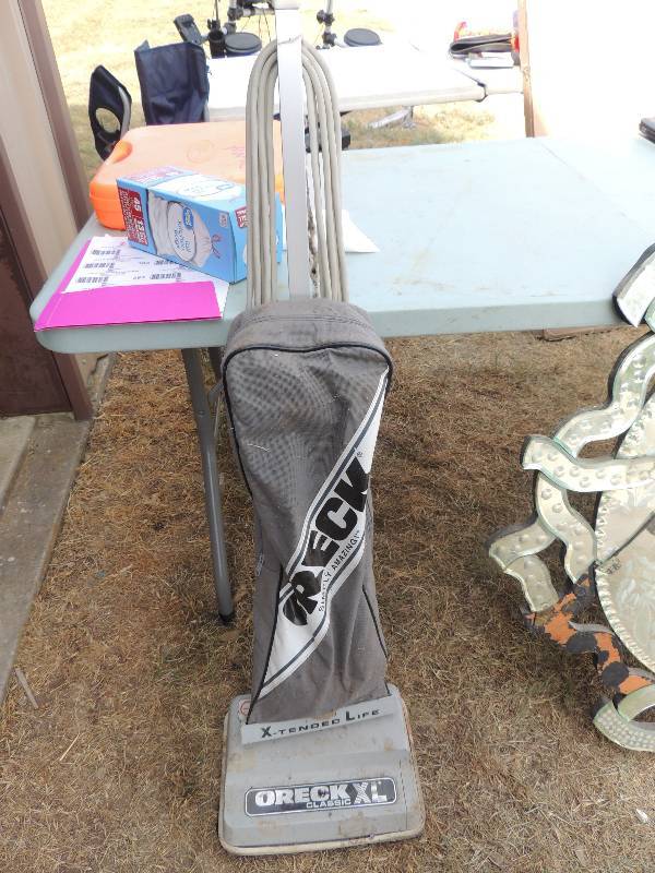 lot 404 image: Oreck vacuum cleaner with bag...