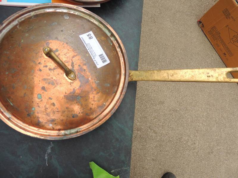 lot 85 image: Copper covered skillet...