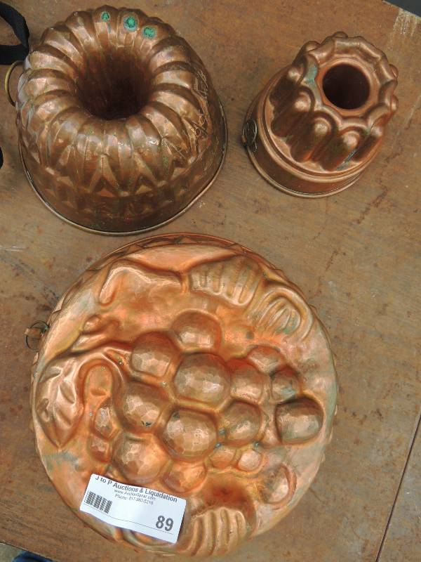 lot 89 image: 3 copper jello molds...