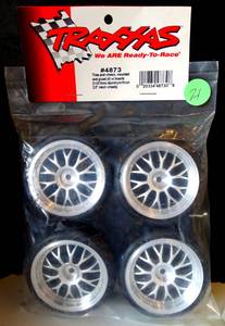 lot 21 image: NEWSEALED - Traxxas 4873 ProTrax Slick Tires and Wheels Glued (4) Nitro 4-Tec