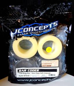 lot 28 image: NEWSEALED - JConcepts Bar Codes 3016-02 2.2 inch Buggy Rear Tire Green (2)