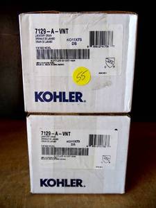 lot 55 image: NEWSEALED - KOHLER Bathroom Sink Grid Drain with Overflow in Vintage Nickel (2X$)