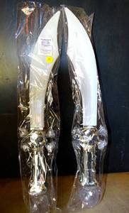 lot 199 image: FUN CENTRAL LED LIGHT UP SKULL CRYSTAL PIRATES SWORDS (2X$)