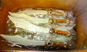 lot 200 image: SELLERS BUNDLE - FUN CENTRAL LED LIGHT UP SKULL CRYSTAL PIRATES SWORDS (40X$)