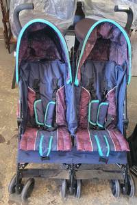 lot 62 image: DOUBLE-STROLLER AS SHOWN.