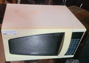 lot 73 image: SUNBEAM MICROWAVE AS SHOWN. TESTED AND WORKING.