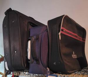 lot 233 image: LOT OF SUITCASES AS SHOWN.