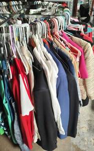 lot 210 image: LARGE LOT OF ASSORTED CLOTHING AS SHOWN. SOME MAY HAVE TAGS. NICE MIXED LOT