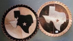 lot 140 image: (2) TEXAS THEMED LEATHER TABLE MATS.
