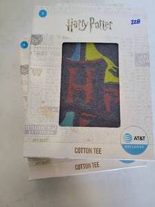 lot 228 image: (2) HARRY POTTER T-SHIRTS IN BOXES.