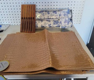 lot 230 image: FAUX LEATHER PLACEMATS, KNIVES, AND MORE.