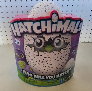 lot 238 image: HATCHIMALS GAME IN PACKAGE.