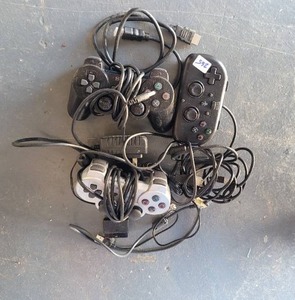 lot 265 image: LOT OF GAMING CONTROLS AND MORE.
