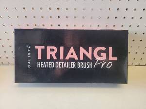 lot 292 image: TRIANGL HEATED DETAILER BRUSH PRO IN BOX.