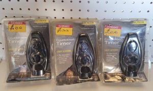 lot 219 image: (3) LIGHT SENSING TIMERS IN PACKAGES.