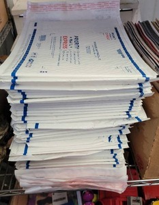 lot 339 image: LOT OF PRIORITY MAIL SHIPPING ENVELOPES.