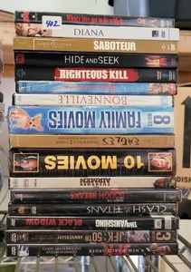 lot 402 image: LOT OF ASSORTED DVDS AS SHOWN.