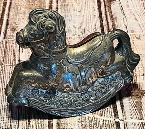 lot 40 image: Classic Ornate Vintage Pewter Rocking Horse Baby Coin Bank