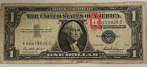 lot 17 image: 1957 STAR NOTE One Dollar Blue Seal Silver Certificate