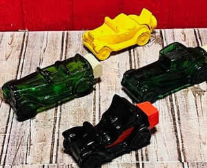 lot 144 image: Four Vintage Avon Collectible Cologne Bottles - Including Electric Charger, Maxwell 23, &amp Sterling Six II