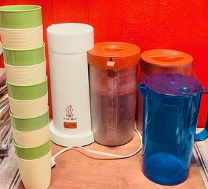 lot 244 image: The Iced Tea Pot by Mr. Coffee, Three Pitchers, and Five Vintage Tumblers