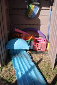lot 13 image: Content of Rubbermaid Cabinet (Pool Toys, PH-Treatment and PVC Pipe Fittings)
