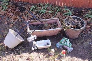 lot 24 image: Planters, Welcome Frog and Bear Yard Statues, Solar Bird Bobbles