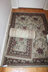 lot 30 image: (2) Area rugs 4x6 entry rug and hallway rug