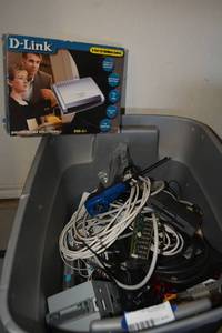 lot 240 image: Misc. Electronics Cables, Cat5 and 6 routers and digital TV reciever