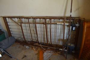 lot 373 image: Attic contents Wrought iron headboard, hospital bed ends, mattress