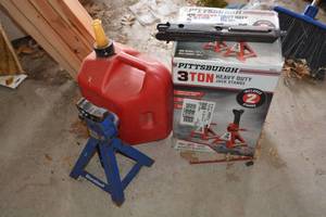 lot 259 image: Jack Stands and Plastic Gas Can car tire wrench