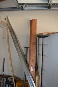lot 258 image: 3 2x4 Wood studs and misc boards and more
