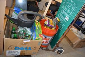 lot 272 image: Garden lot Dolly, Clear vases and sand, Watering Can, Trash bag opener, Sprinkler