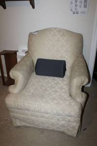 lot 145 image: Cream colored armchair