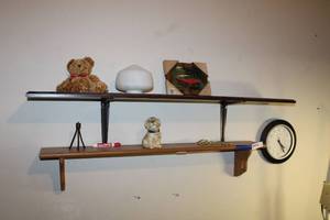 lot 154 image: Wooden Wall shelves with contents, wall clock office chair and chair mat