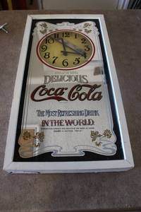 lot 233 image: Vintage Coca-Cola wall clock and mirror sign
