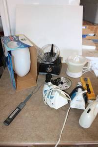lot 234 image: Misc lot irons, Juicer, food processor parts, meat thermometer, Vicks Vaporizer