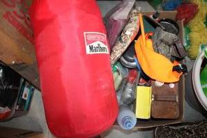 lot 327 image: Camping Lot sleeping bag, candles, lanterns, rain jacket