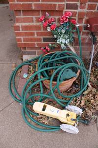 lot 362 image: Garden hose, Tractor sprinkler, planter artificial roses