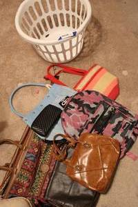 lot 187 image: Purses, bags and laundry basket Includes Pink camo backpack still with tags, Blue suede bag, yarn bag