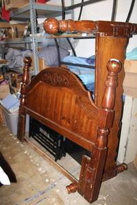 lot 12 image: Full or Queen size wood headboard and footboard, has slots for either also has metal bedframe