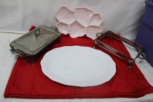 lot 40 image: Red Tablecloth, White turkey platter, pink glass relish tray and silver plate casserole stands