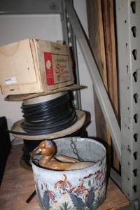lot 125 image: Ceramic Duck planters, Chili pepper lights, and rubber trim on spools