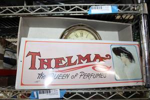 lot 230 image: Vintage metal perfume sign, Wire metal mantle clock