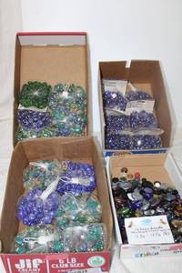 lot 242 image: Generous amount of colored glass beads and accent marbles
