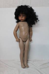 lot 246 image: Monique Collection Black wig and doll